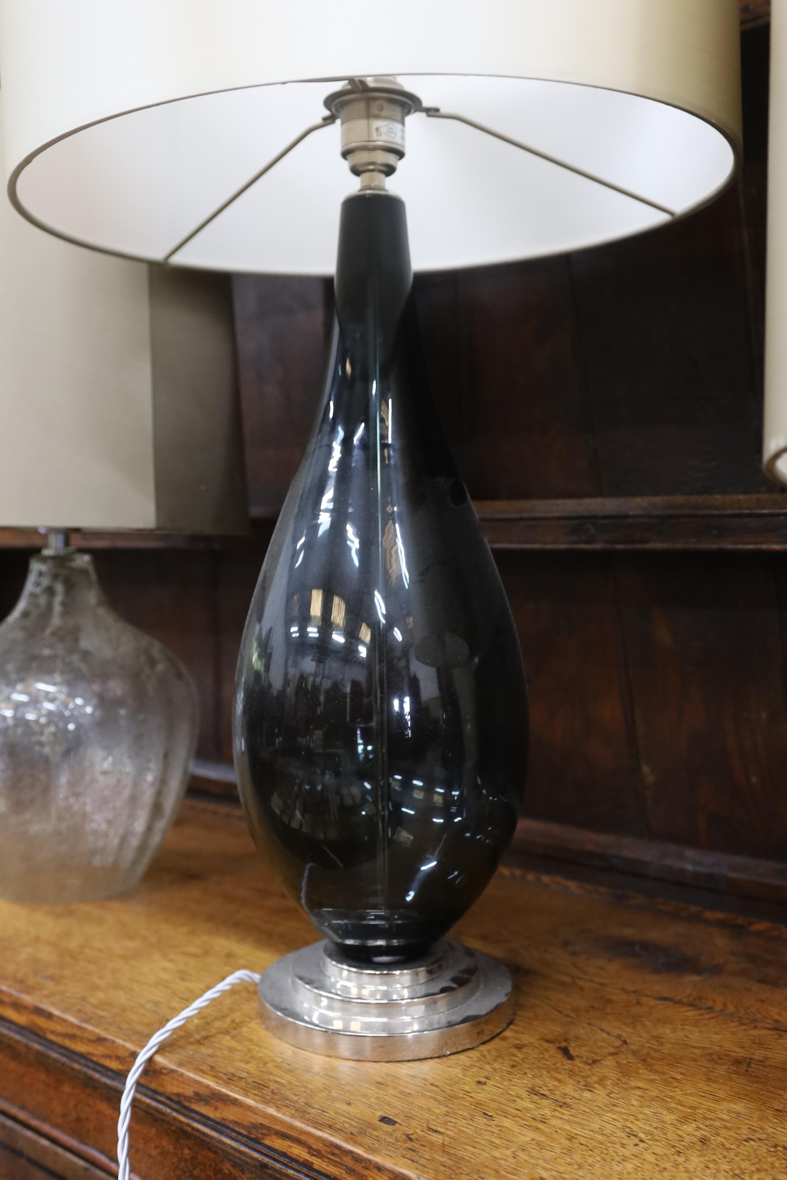 A contemporary Porta Romana baluster glass table lamp and shade, height 78cm together with two other contemporary glass table lamps